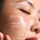 Enlarge image of Close-up of a model&amp;#39;s face with text overlays showing skincare benefits