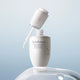 Enlarge image of Sulwhasoo Lumiwise Brightening Ampoule Serum bottle with dropper on a light blue background