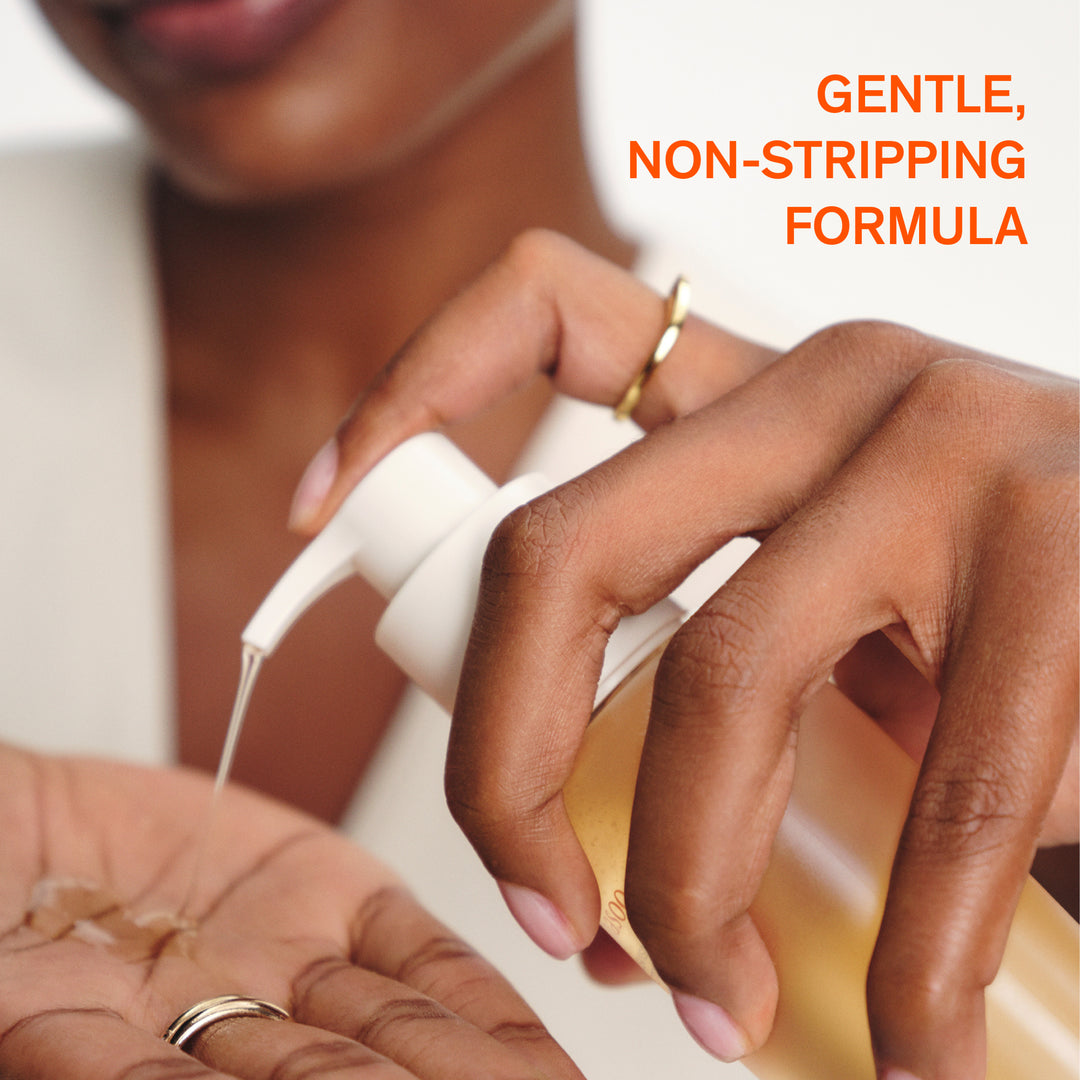 Person applying a skincare product to their hand with text 'Gentle, Non-Stripping Formula' in the corner.