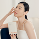 Enlarge image of Sulwhasoo First Care Activating Mask, beauty model holding product