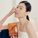 Enlarge image of Sulwhasoo First Care Activating Mask, beauty model holding product