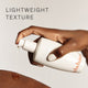 Enlarge image of Sulwhasoo First Care Activating Serum, model pumping product onto hand showcasing lightweight texture