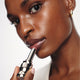 Enlarge image of Dark skin beauty model holding and wearing product in shade NO.330 Bloom