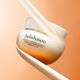 Enlarge image of Sulwhasoo cream jar with applicator on a peach background
