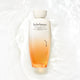 Enlarge image of Sulwhasoo skincare bottle with gradient design on a white background