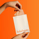 Enlarge image of Sulwhasoo First Care Activating Mask, hand model pulling sheet from sheet pouch