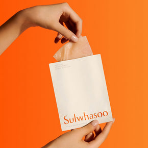 Sulwhasoo First Care Activating Mask, hand model pulling sheet from sheet pouch