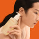 Enlarge image of Sulwhasoo Gentle Cleansing Foam, Facial Cleanser, beauty model holding bottle