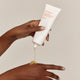 Enlarge image of Sulwhasoo White Ginseng Radiance Refining Mask, Skincare Face Mask, model squeezing product onto hand