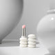 Enlarge image of Lipstick with a unique white ceramic holder on a gray background