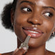 Enlarge image of Dark skin beauty model holding and wearing product in shade NO.310 Terra