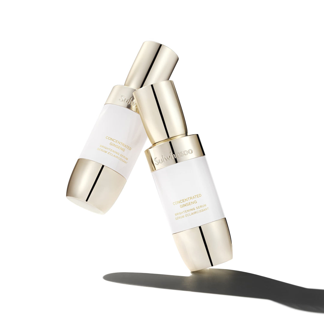 Two bottles of Concentrated Ginseng Brightening Serum on white background